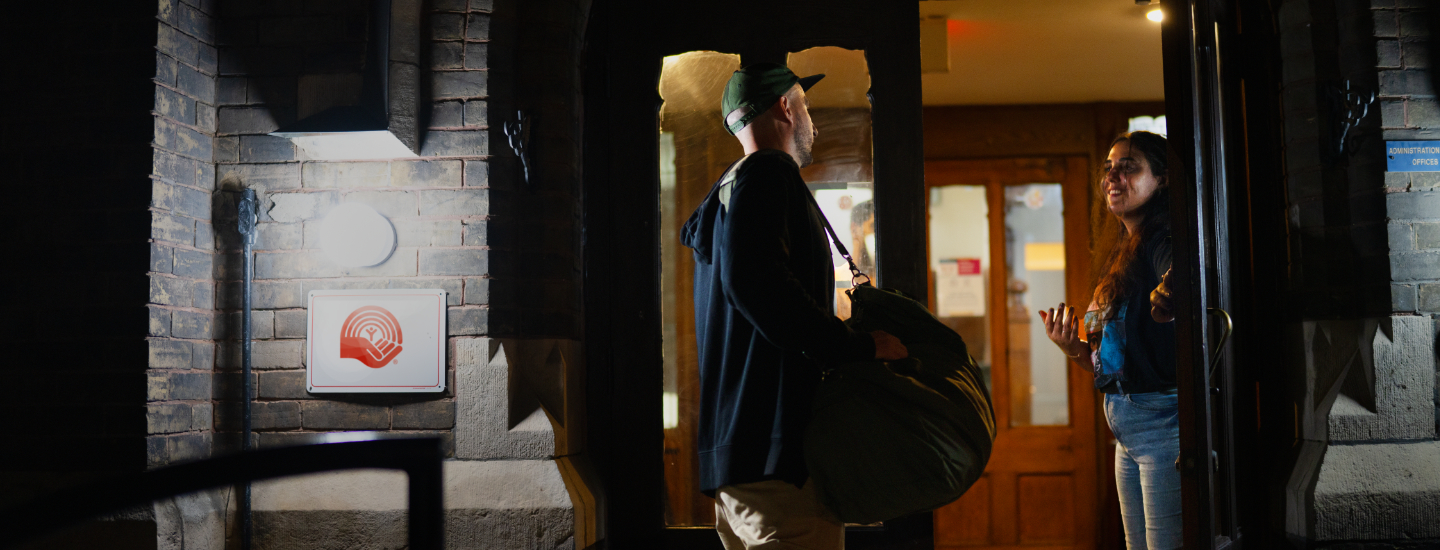 Man entering homeless shelter