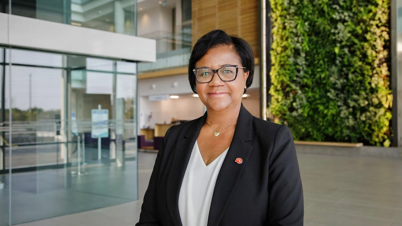 Lisa Gonsalves, board chair of United Way Greater Toronto, smiles and looks into the camera. 