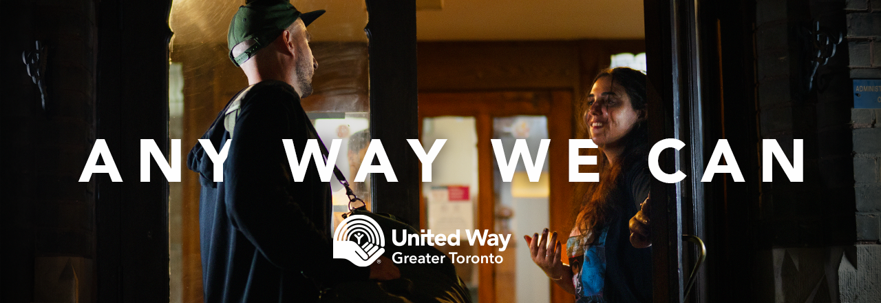 A man and woman talking in a vestibule with the text ‘Any way we can’ over the photo and the United Way Greater Toronto logo