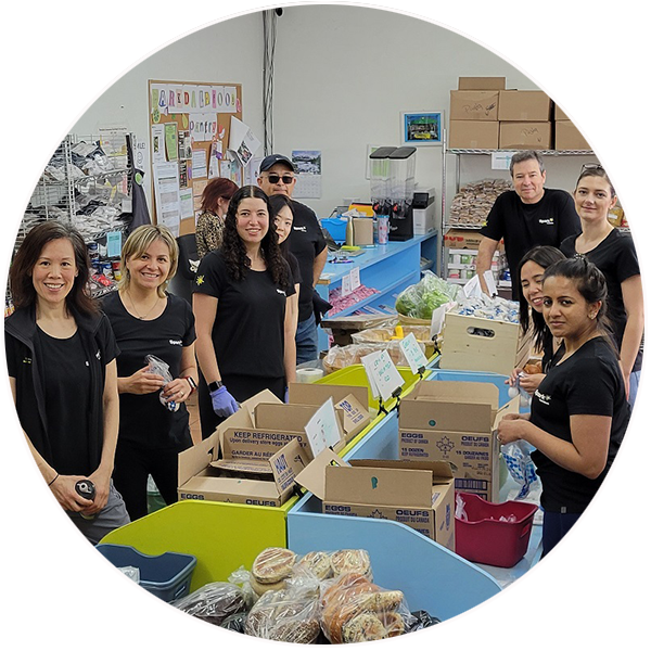 A group of volunteers packing food donations.